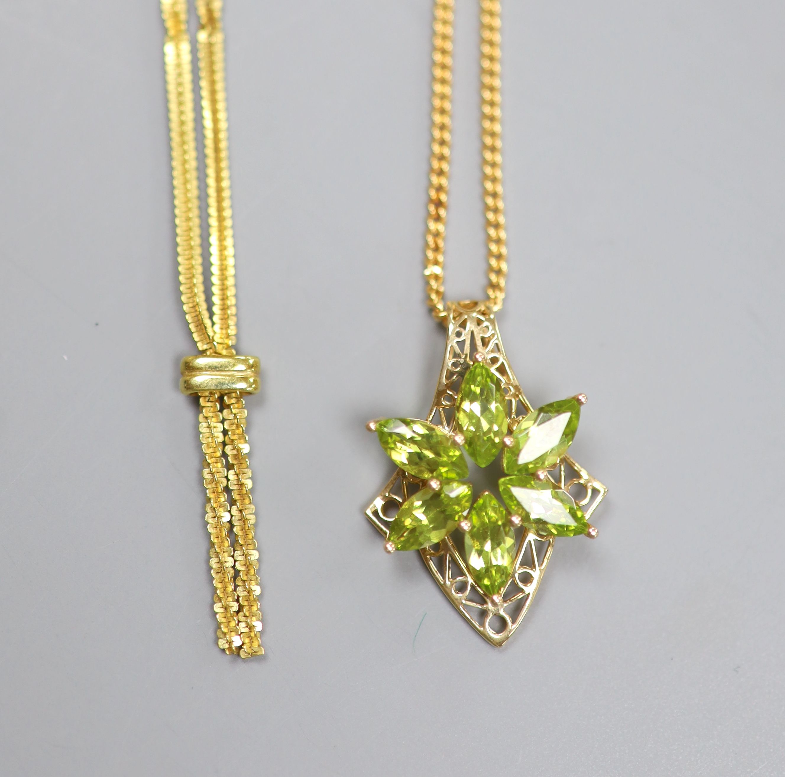 An Italian 9ct gold necklace and a 9ct gold and peridot-set necklace